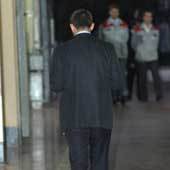 Олег Дерипаска (спиной на фото) может расстаться как минимум с частью своих строительных активов