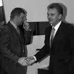 Виктор Христенко (справа) повысит цены для Анатолия Чубайса